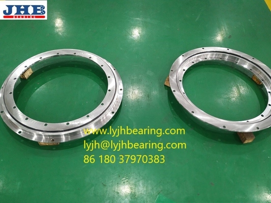 Es el RKS.23.0741 Rodamiento giratorio con brida de 848*634*56 mm para equipos de camiones de carga proveedor